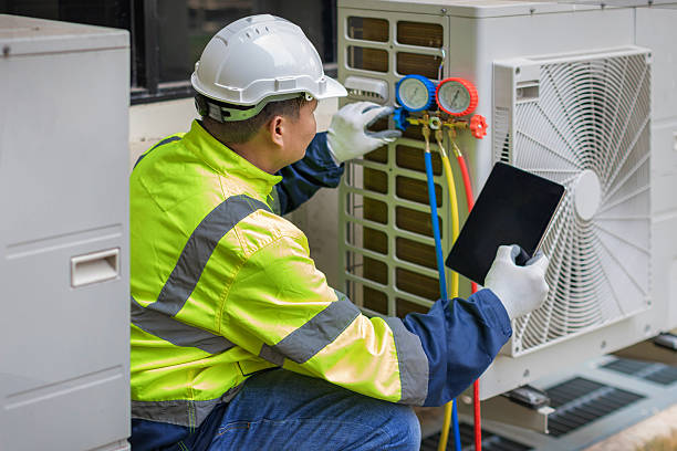 Professional Heat Pump Repair technician working in Rensselaer, NY